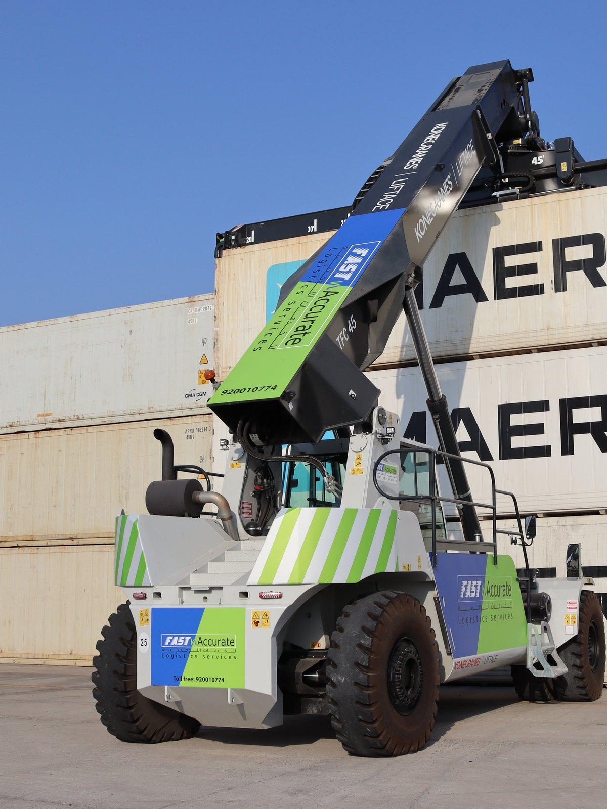 Reach stacker handling MAERSK containers at the Fast n Accurate terminal